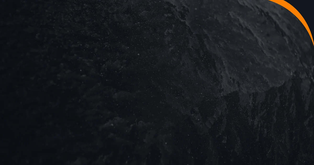 A closeup of black ice on a road